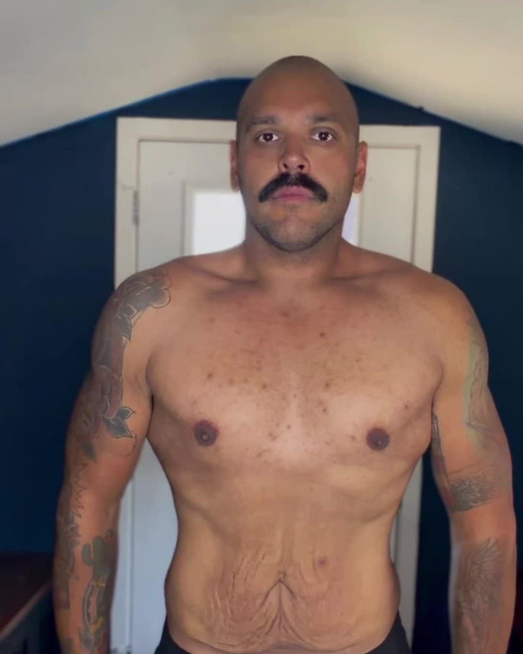 After: Kody shirtless and visibly leaner at about 225 pounds, 2026.